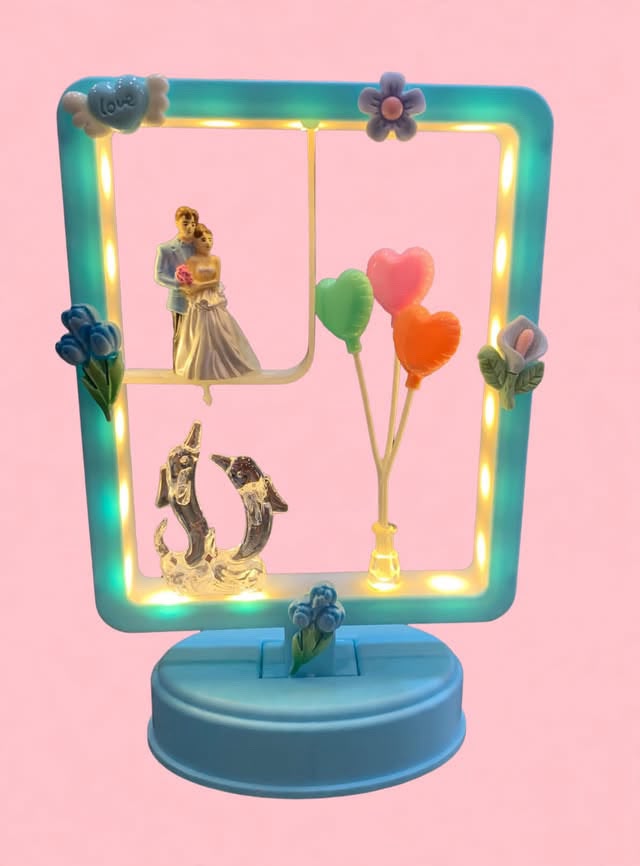 LED light romantic couple night lamp and tabletop musical showpiece.